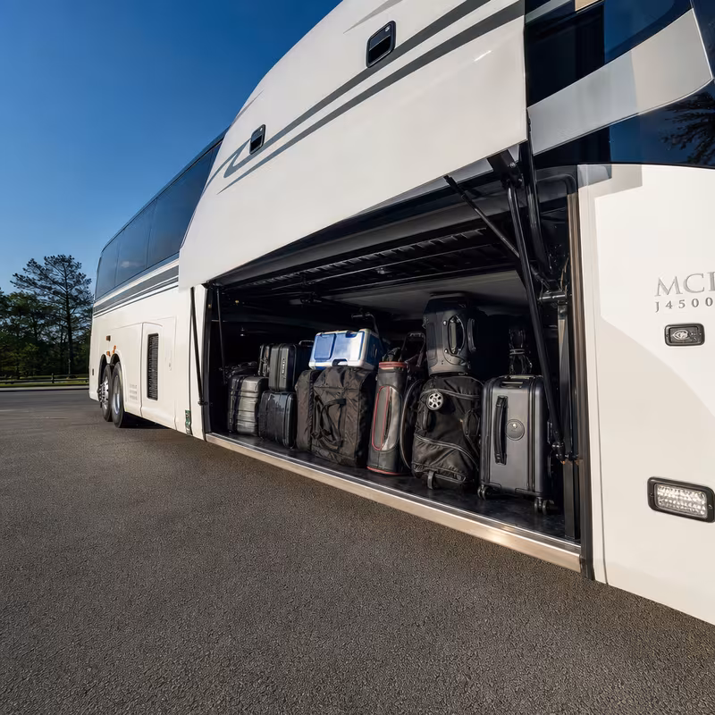 Party bus interior with wraparound leather seating and LED lighting in San Antonio