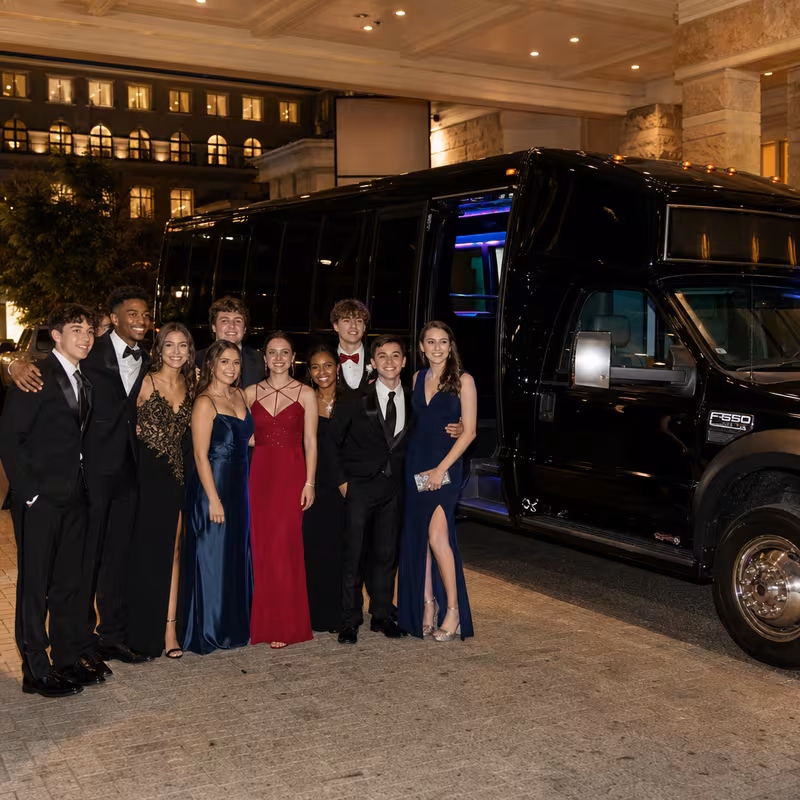 Party bus interior with wraparound leather seating and LED lighting in San Antonio