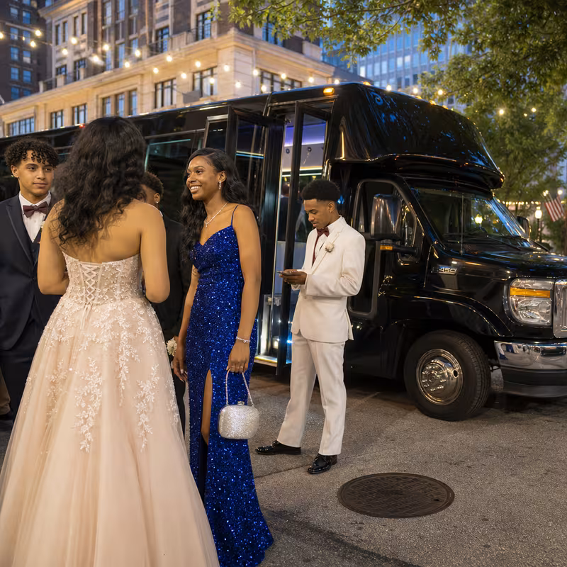Passengers loading luggage while boarding an San Antonio group shuttle