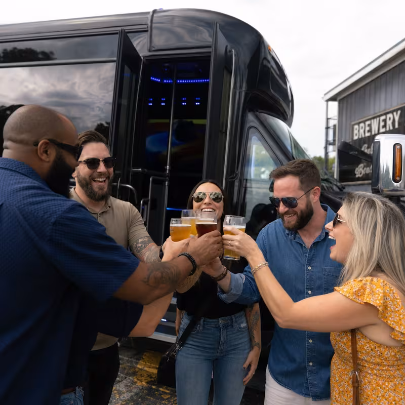 Passengers loading luggage while boarding an San Antonio group shuttle